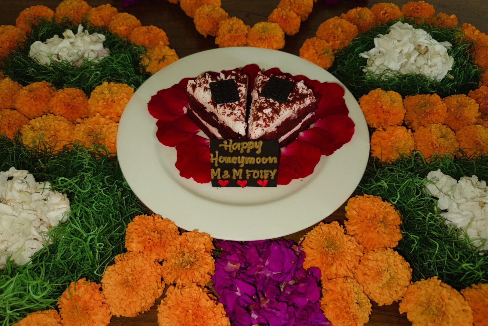 Heart-shaped cake surrounded for The Honeymoon Haven