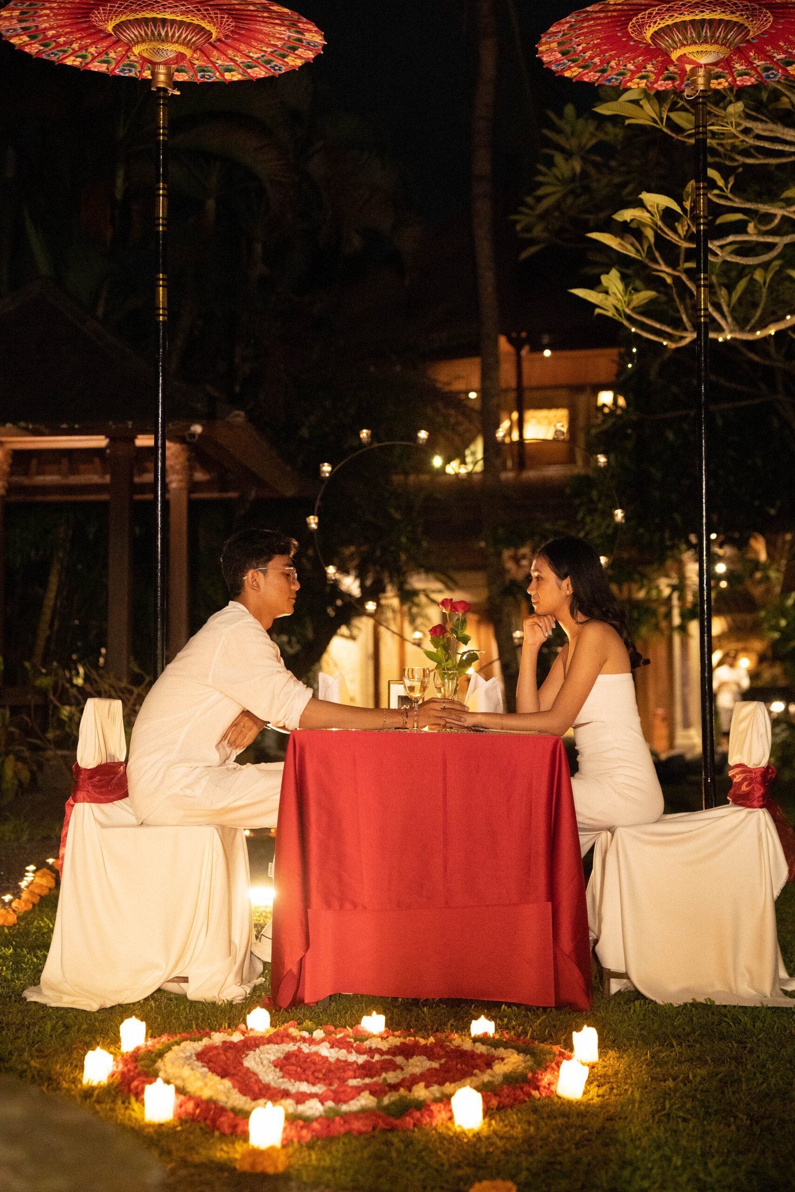 Balinese Romantic Dinner under decorative umbrellas.