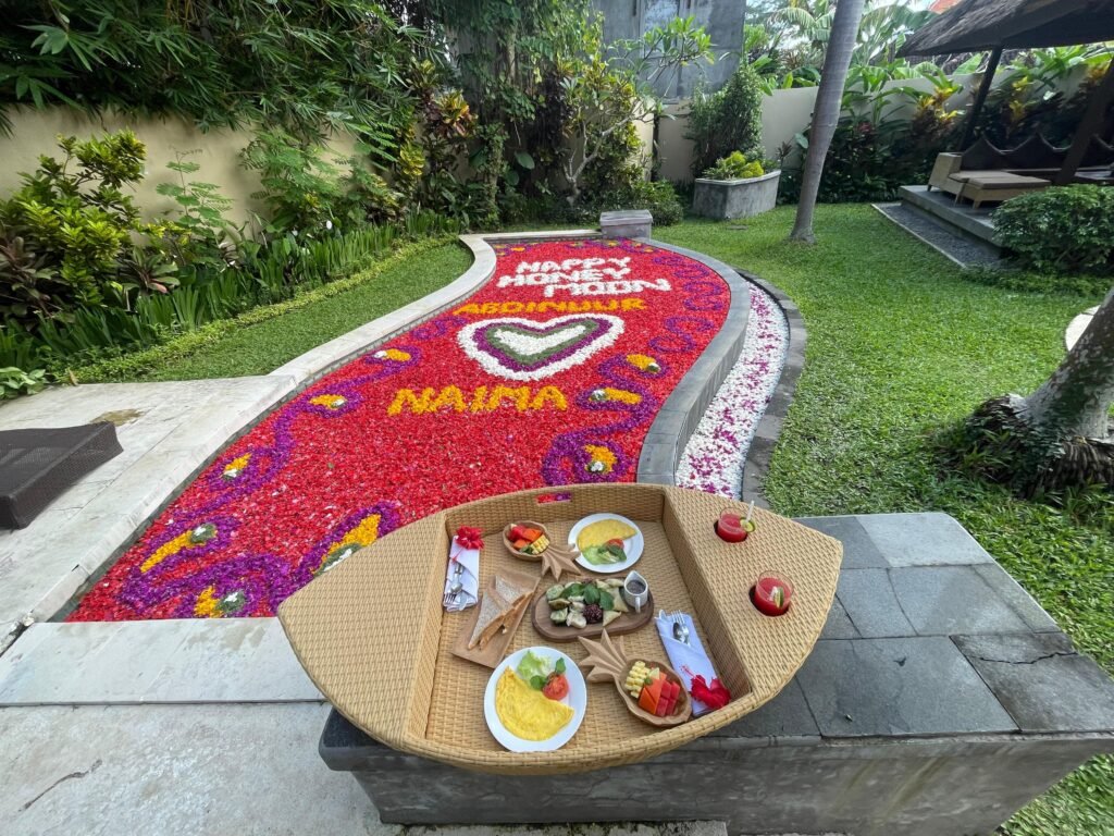 Petals on the Water arrangement with food