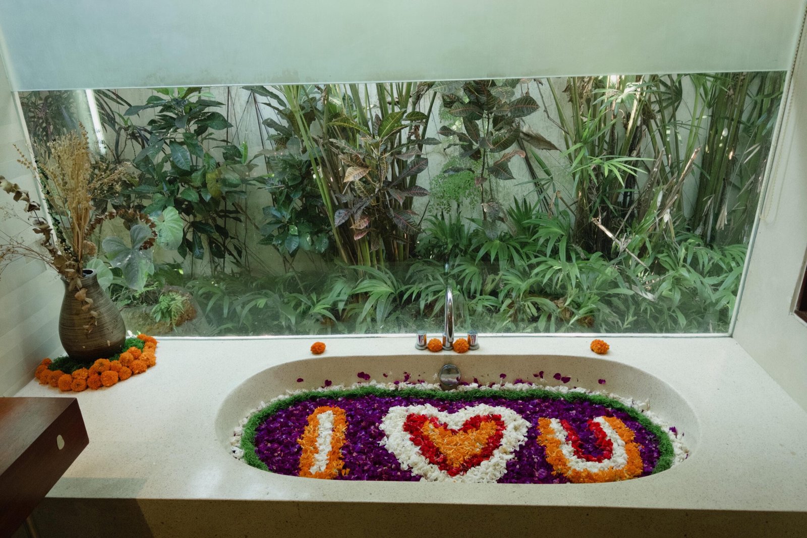Bathtub decorated with flower petals