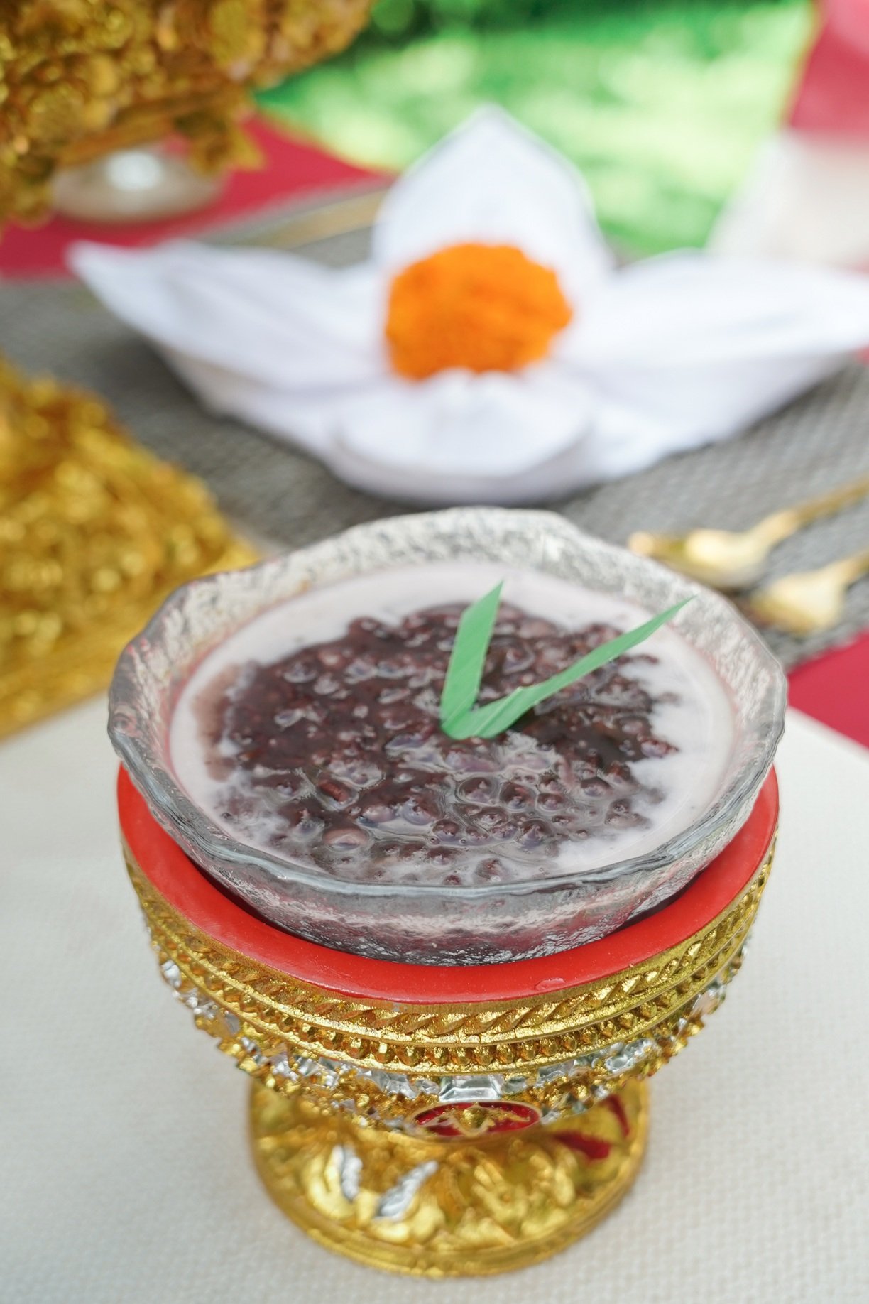 Dessert in ornate bowl with decoration for romantic dinner called serenade by the stars