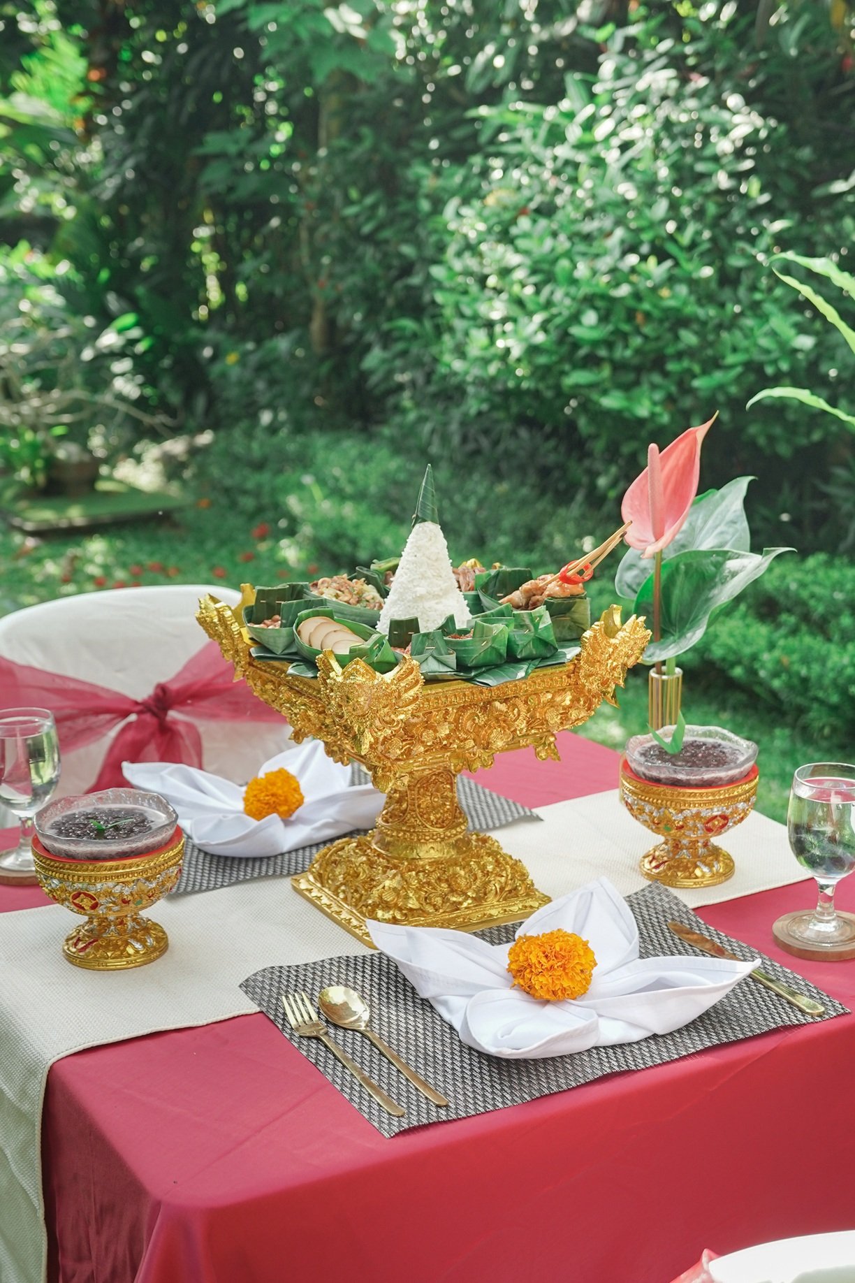 Elegant table setting with decorative centerpiece for romantic dinner called serenade by the stars