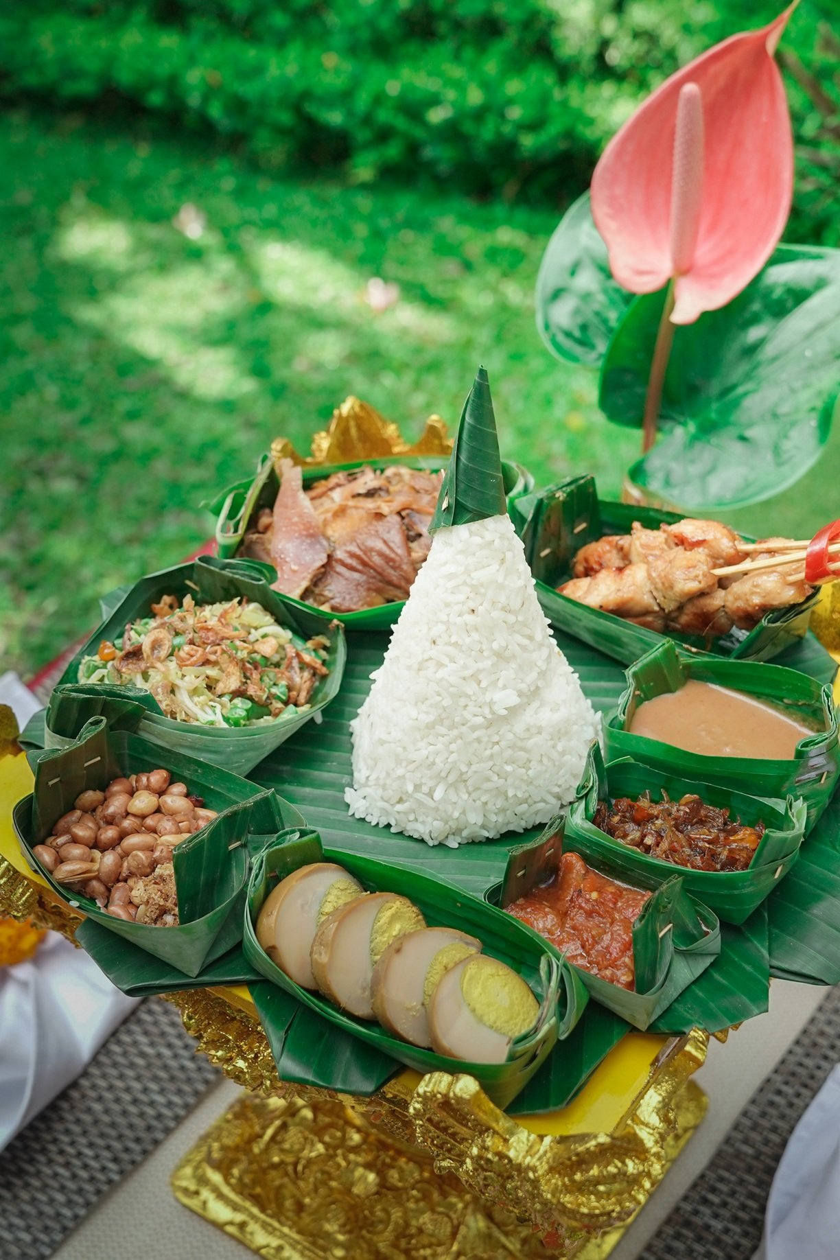 Traditional Indonesian rice dish presentation for romantic dinner called serenade by the stars