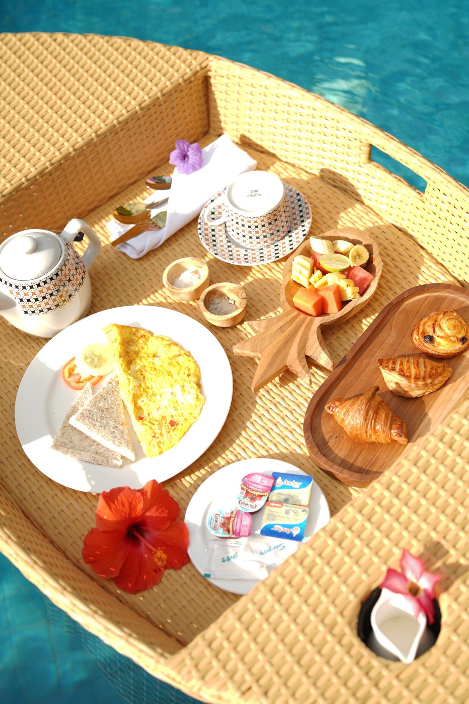 Breakfast tray floating in water called Morning Symphony